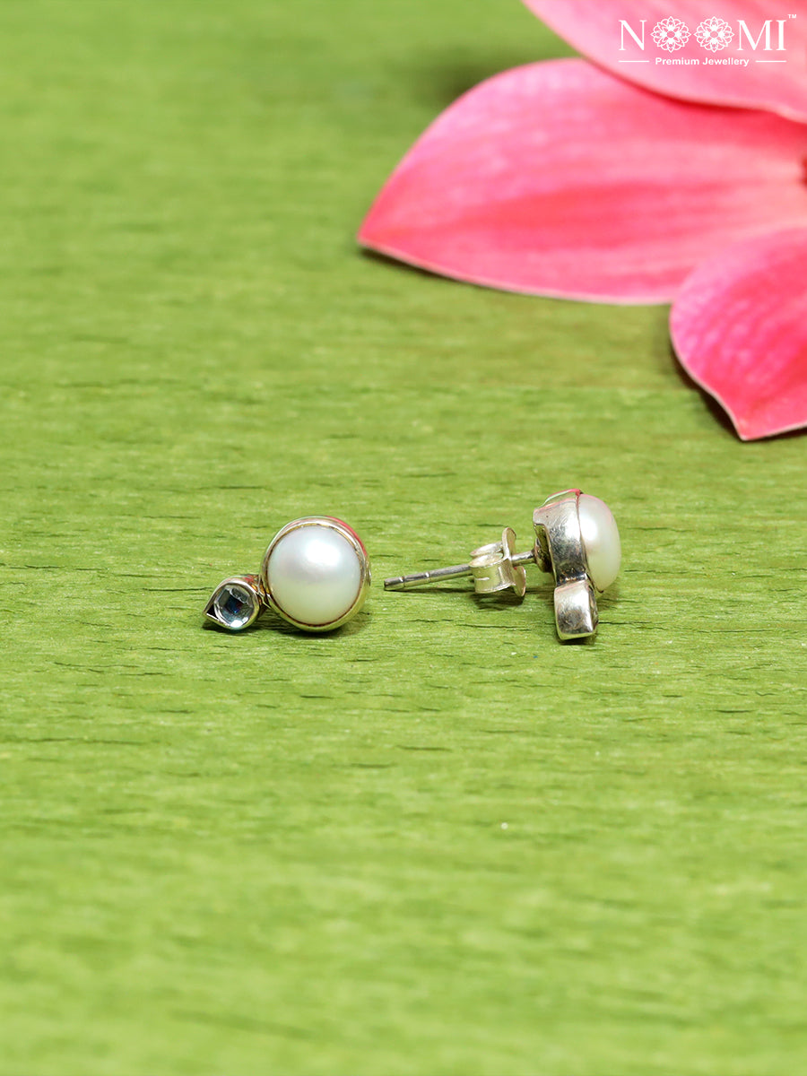 Delicate Pearl Stud Earrings. Designer Earrings in 925 Silver.