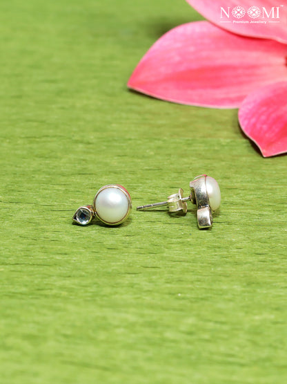 Delicate Pearl Stud Earrings. Designer Earrings in 925 Silver.